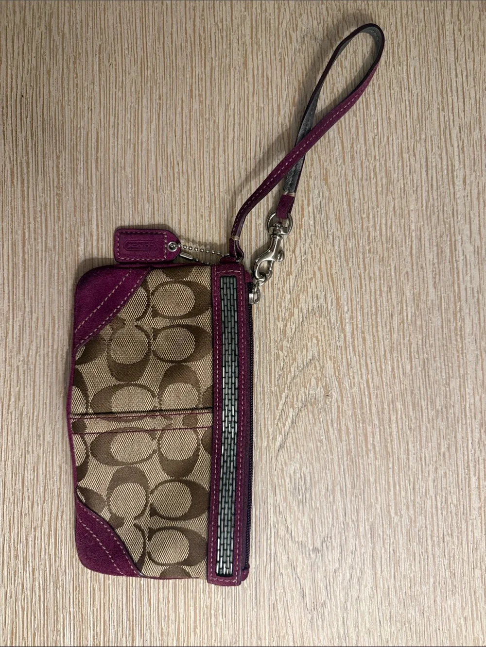 Coach Brown Signature Canvas Wristlet with Plum Trim